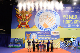 At the kick-off ceremony, officiating guests kick off the finals of the Hong Kong Open Badminton Championships.