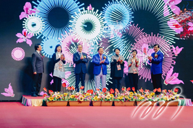 At the kick-off ceremony, officiating guests kick off the finals of the Hong Kong Open Badminton Championships.