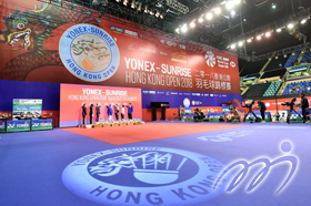 At the kick-off ceremony, officiating guests kick off the finals of the Hong Kong Open Badminton Championships.