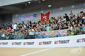 The home crowd are cheering on the Hong Kong Cycling Team.