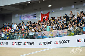 The home crowd are cheering on the Hong Kong Cycling Team. The home crowd are cheering on the Hong Kong Cycling Team.
