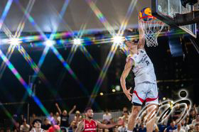 Oliver Xu, player of Hong Kong, China 3x3 Men's Team dunk in the game against Switzerland