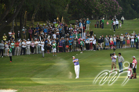 Sam BRAZEL is making his approach shot to the green of the 18th hole in the final round.