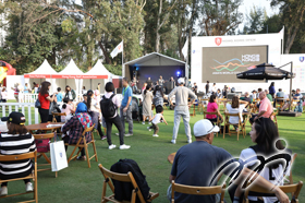 Crowds watch the band in the Hong Kong Open Spectator Village