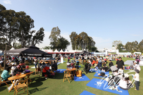 Families relax in the Hong Kong Open Spectator Village