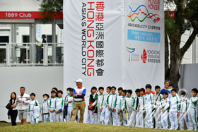 School children take in the action