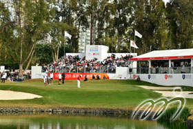 Tomoharu Otsuki (Japan) putts on the 18th Green