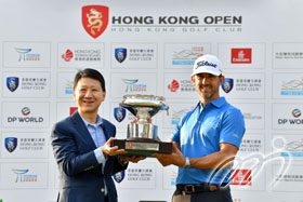 Wade Ormsby is presented with the HK Open trophy