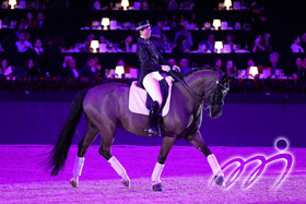 Hong Kong Individual Dressage Gold medalist at the 18th Jakarta Asian Games, Jacqueline Siu performing at the Masters with her winning horse Jockey Club Furest on Tour.