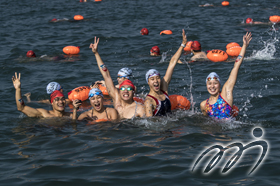 Hong Kong top swimmers also participated in charity group to swim across the Victoria Harbour.