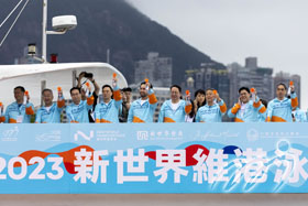 Mr. Eric Chan, Chief Secretary for Administration(5th from right), Mr. Kevin Yeung, Secretary for Culture, Sports and Tourism of HKSAR(5th from left), Dr. Adrian Cheng, CEO of New World Development(Centre) and the Executive Directors of NWD Mr. Eric Ma(4th from left) and Mr. Nam Hoi Sitt(3rd from left), Hon. Kenneth Fok, Member of Legislative Council(3rd from right), Mr. King Shing Tang, Chairman of Hong Kong Sports Institute(2nd from right) and Mr. John West, Member of Open Water Swimming Technical Committee of World Aquatics(1st from right), joined Mr. Ronnie Wong, President of HKGSA(4th from right), officiated the gun-firing ceremony at 7:30am in the morning and mark the official opening of the New World Harbour Race. 