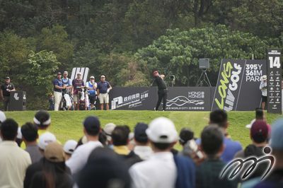 Spectators watch the action during the final round