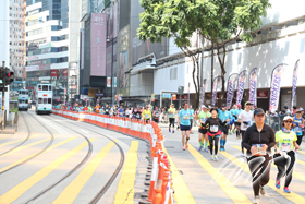 In the final section of the route, runners are heading along Hennessy Road for the finish at Victoria Park in Causeway Bay.