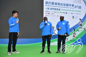 The Hong Kong Amateur Athletic Association collects old running shoes and spikes in collaboration with the Benin Athletics Federation and donate them to athletes in Benin so as to facilitate athletic development there.  The picture above shows that Mr Vierin A DEGON (first from right), Chairman of the Benin Athletics Federation, is attending the Standard Chartered Hong Kong Marathon Carnival.