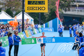 Volha Mazuronak of Belarus wins the overall championship of women's marathon and also smashes the record in a time of 2:26:13.