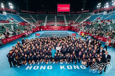 Miss Law Shuk Pui, Rosanna, JP, Secretary for Culture, Sports and Tourism Culture, Sports and Tourism Bureau and Bank of China Hong Kong Tennis Open 2025 singles champion Alexandre Muller pose for photos with tournament volunteers, officials, and staff after the trophy presentation.