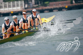 Representatives from Royal Hong Kong Yacht Club (HKG) in the Coastal Men's Coxed Quadruple Sculls in action