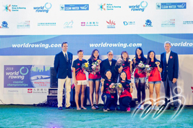 Group Photo of Mr. Timothy Fok, GBS, SBS, JP, President of the SF&OC of Hong Kong, China presented medals to the winners of Coastal Women's Coxed Quadruple Sculls (HKG) accompanied with Mr. Jean-Christophe Rolland, President of World Rowing Federation and Mr. Mike Tanner, MH, Chairman of the Hong Kong, China Rowing Association