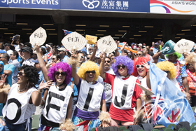 Fiji fans at stadium cheering for the team.