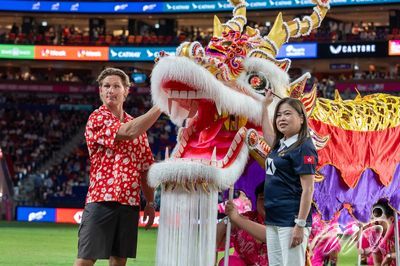Australia rugby legend Michael Hooper joins Secretary for Sport, Culture and Tourism Rosanna Law for the traditional eye-dotting ceremony on Friday night