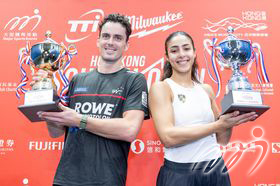 Men's Champion - New Zealand player Paul Coll (Left) and Women's Champion V Egyptian player Hania El Hammamy (Right)