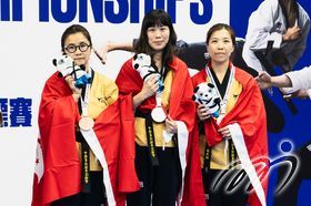 The third-place winners in the Recognized Poomsae Female Team U60 - the Hong Kong, China Taekwondo Poomsae Team (From left)MA Cheuk Man, TSE Ka Man and YANG Yin Hing