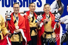 The third-place winners in the Recognized Poomsae Male Team U60 - the Hong Kong, China Taekwondo Poomsae Team (From left)KWOK Chi Kuen, AU Kit Tung and CHAN King Lin