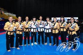 Group photo of award-winning Taekwondo Poomsae athletes from Hong Kong, China