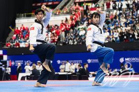 (From left) Athletes CHAN Chung Yin and CHAN Ka Yi, representatives of the Hong Kong,China Taekwondo Poomsae Team in Recognized Poomsae Pair U30