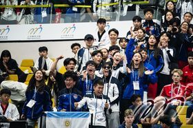 Athletes cheering for their National Team