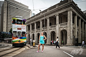 The former world number one, Jelena JANKOVIC from Serbia, poses with a tram in front of the former Legislative Council Building in Central.