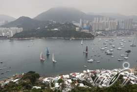 Boats of various teams are battling it out during the Around Hong Kong Island Race. Boats of various teams are battling it out during the Around Hong Kong Island Race.