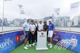 Henrik Stenson (Sweden), Wade Ormsby (Australia), Captain of Hong Kong Golf Club Andy Kwok, Taichi Kho (Hong Kong), Kiradech Aphibarnrat (Thailand) and Ian Poulter (England) pose with the World City Championship trophy on the Star Ferry at a media event prior to the start of the tournament.