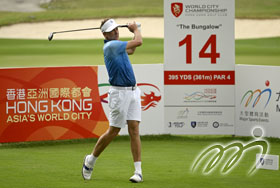 Ian Poulter (England) tees off at the fourteenth hole on the first day of the World City Championship at Fanling.