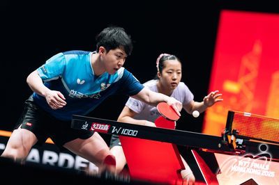 Korea's LIM Jong-hoon and SHIN Yu-bin.