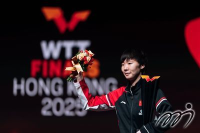 WTT Finals Hong Kong 2025 women's singles champion WANG Manyu shines on the podium, showcasing elite skill and grace.